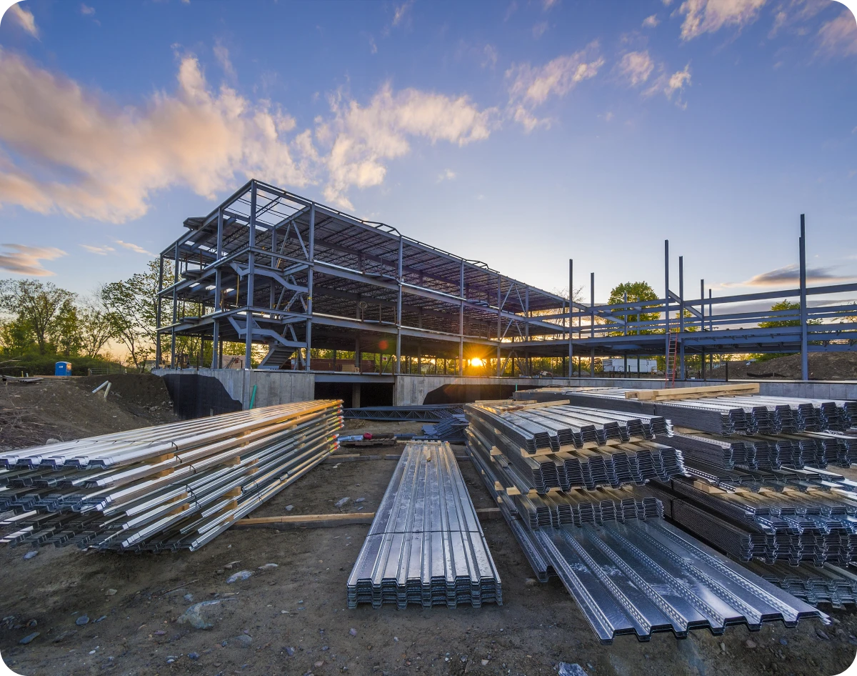 Building under construction at sunset