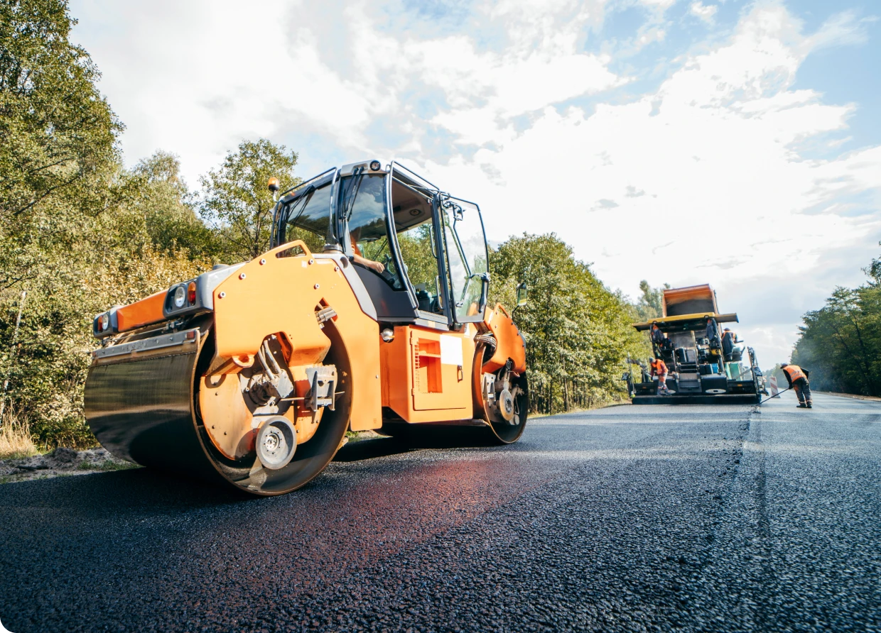 Road roller on freshly paved asphalt